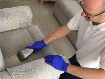 Upholstery Cleaning Langport Somerset - FibreSolve Nathan Cleaning an Armchair